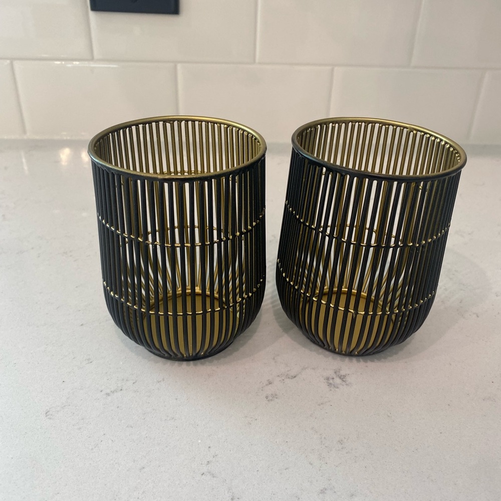 Crate and Barrel (NEW) 100% iron w/powder coat finish. Beautiful black and gold.